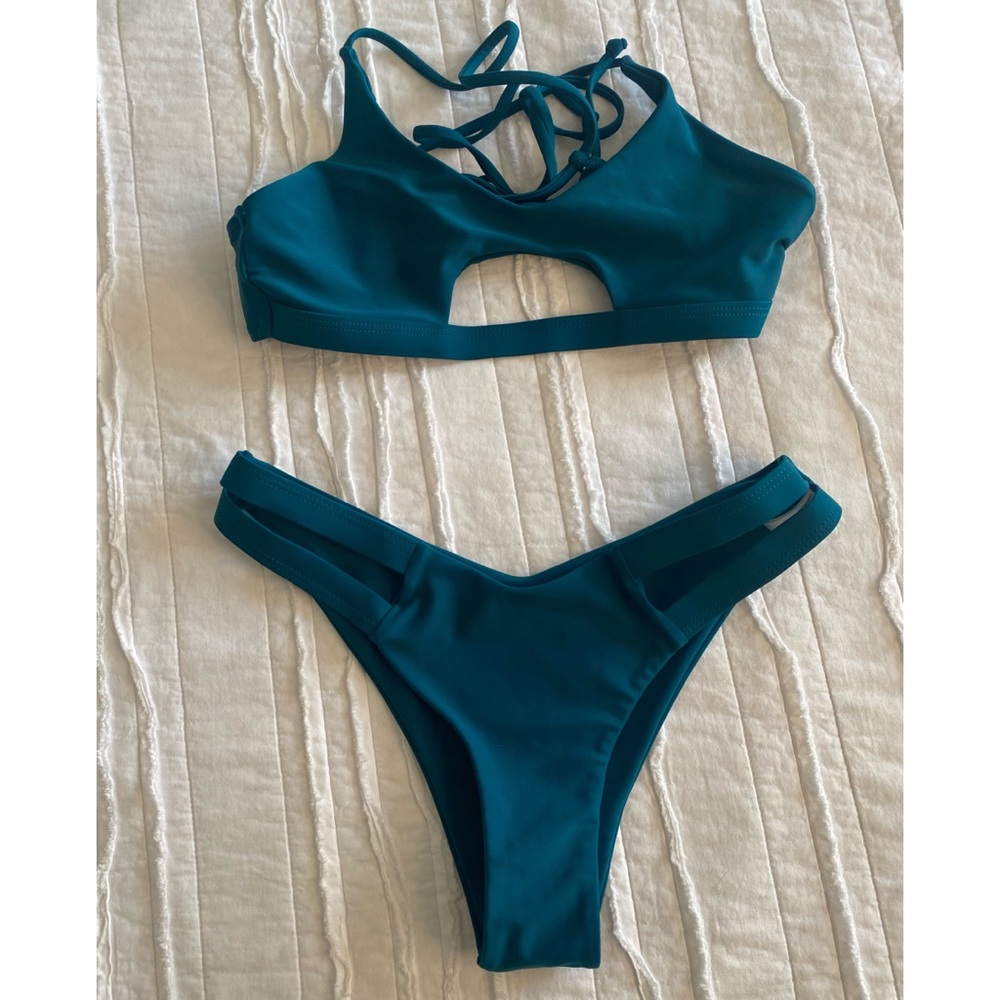 Dark teal bikini, brand new, never worn, no flaws.
